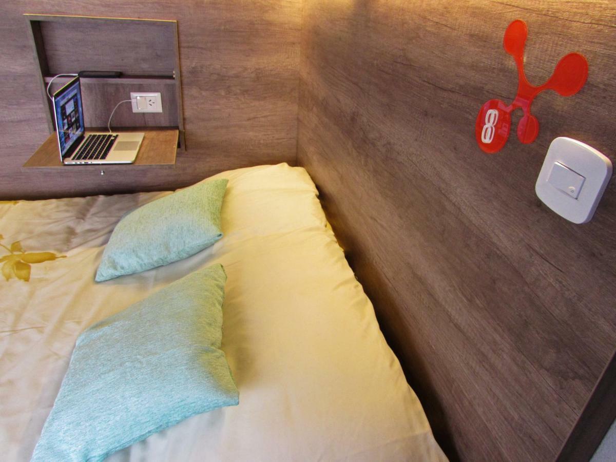 Cama individual en habitación compartida